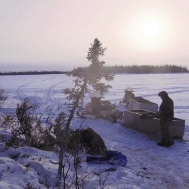 A man stands in a snowy landscape